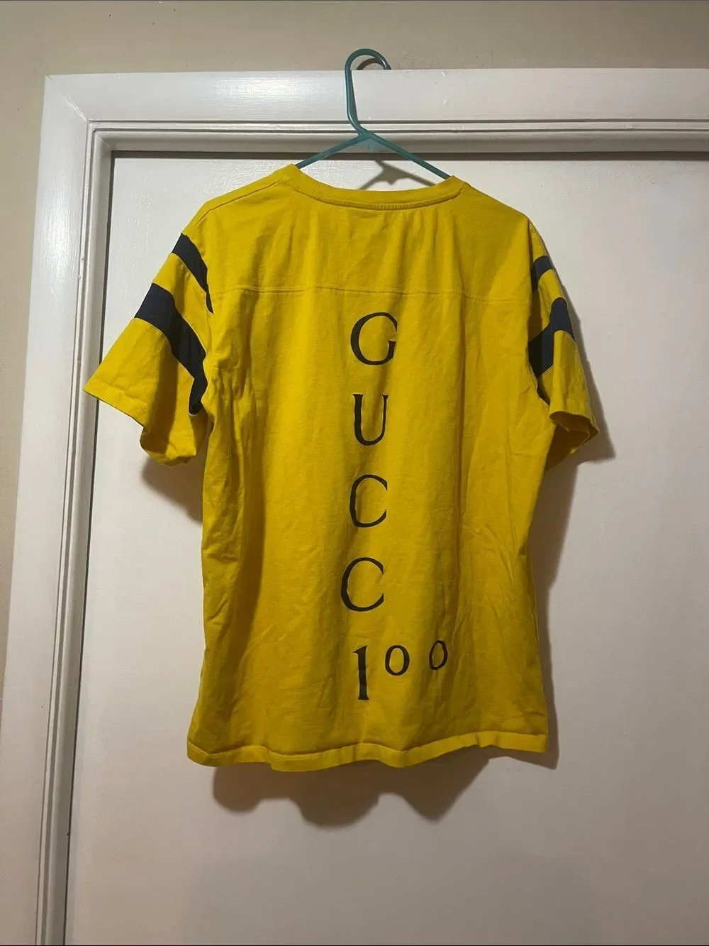 Gucci Yellow Graphic '22705 Songs' Tee with Blue Stripes large